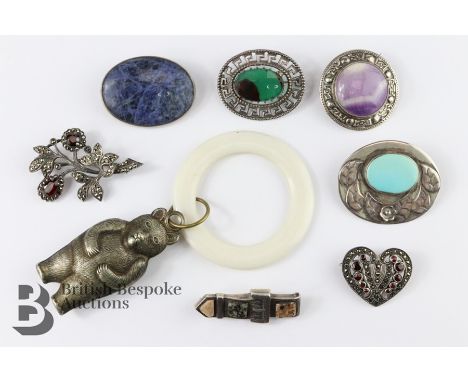 Miscellaneous silver brooches, including turquoise, amethyst, garnet heart-shaped brooch and a hand crafted brooch depicting 