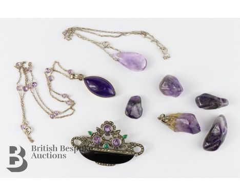 Amethyst jewellery, including a silver marcasite and amethyst floral brooch, marquise-cut amethyst pendant suspended on a bea