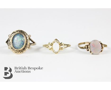 Three 9ct yellow gold and opal rings, the first single opal measures approx 10 x 8mm, size P, approx 3.9 gms, the next ring h