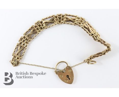 9ct gold gate link bracelet, with 9ct gold heart-shape clasp, approx 160 x 10mm, approx 18.8 gms. Note: in good condition wit