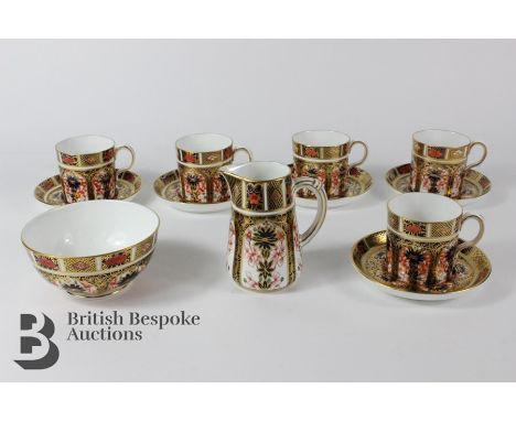 Royal Crown Derby porcelain, including five 'Old Imari' pattern demi-tasse and saucers, with matching cream jug and sugar bow