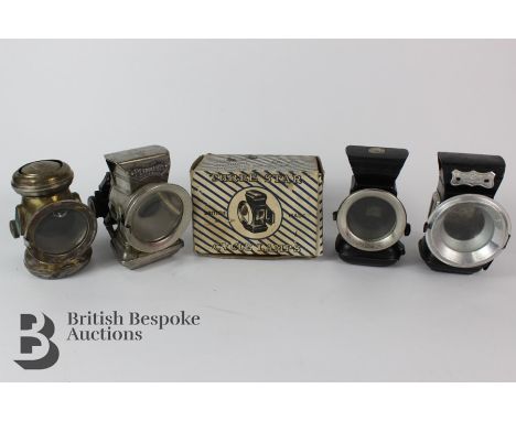 Four early 20th century bicycle oil lamps including a brass Lucas Silver King bicycle oil lamp, Captain No 59, approx 12 cms,