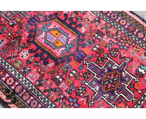 Mid 20th century wool runner, Persian (Iran Gharajeh), salmon ground with geometric design in various colours, selvedges and 