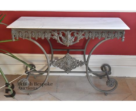 Marble top wrought iron console table, approx 130 l x 57 d x 85 h cms.Note: loss to one corner.