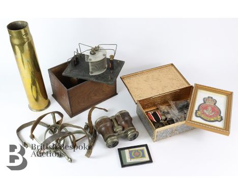 Miscellaneous war era items, a pair of French 8 Verres binoculars encased in leather, brass 6Pr shell case with insignia, oak