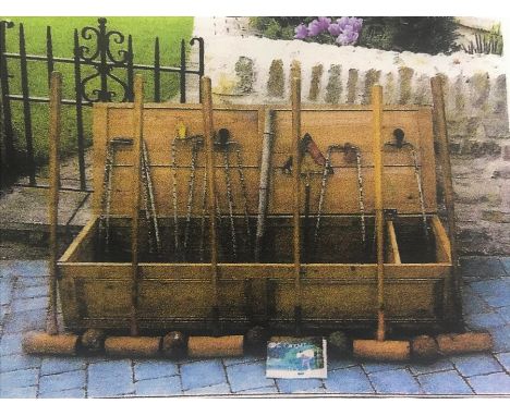 Vintage Slazenger London croquet set. The set comprising six mallets each marked Slazenger London, approx 99 cms l. Six woode