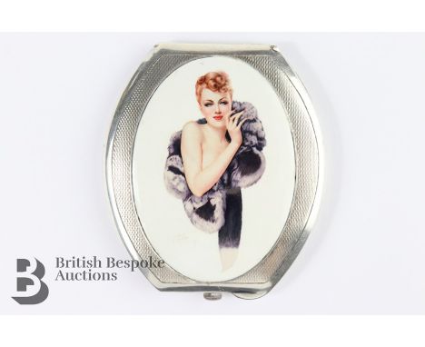 Art Deco silver and enamel set compact, depicting a lady in fur, Birmingham hallmark, dated 1935.