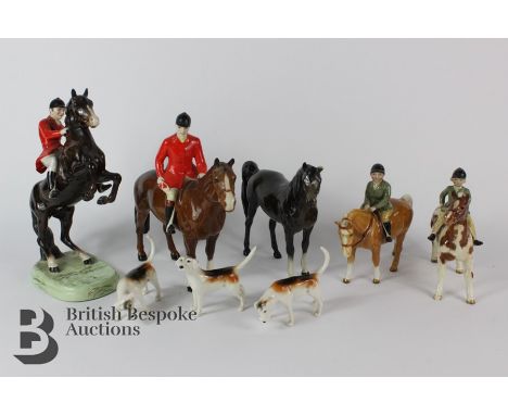 Beswick hunting group, comprising 'Huntsman' nr 868 rearing horse, 'Huntsman' chestnut bay, girl on a pie bald pony, boy on a