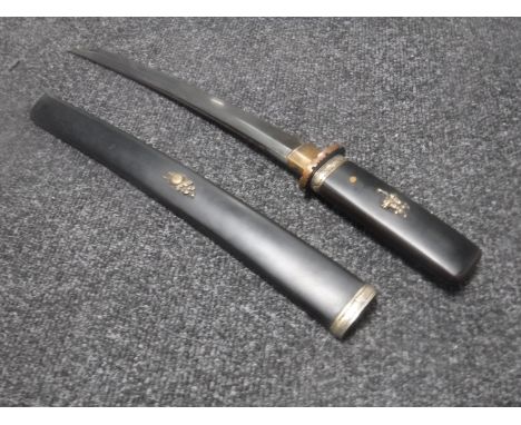 A 20th century Japanese tanto dagger in scabbard