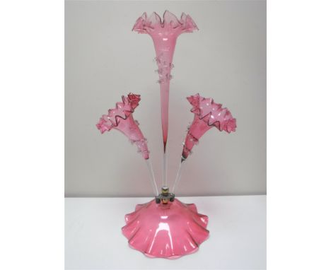 A Victorian three way ruby glass epergne  CONDITION REPORT: Chip to rim of one section. 