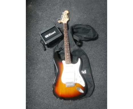 A Star Sound electric guitar in carry bag with mini amplifier 