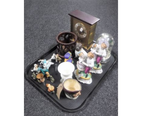 A tray of Royal Doulton character jug, figures, Wedgwood vase, mantel clock, anniversary clock under shade 