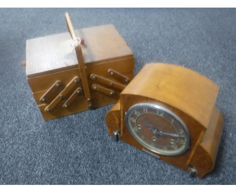 A mid 20th century concertina sewing box and a walnut cased mantel clock 