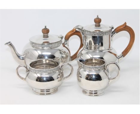 A Lindisfarne silver four-piece tea service, Reid &amp; Sons, London 1962 and 1963, hot water jug 18cm high (4) CONDITION REP