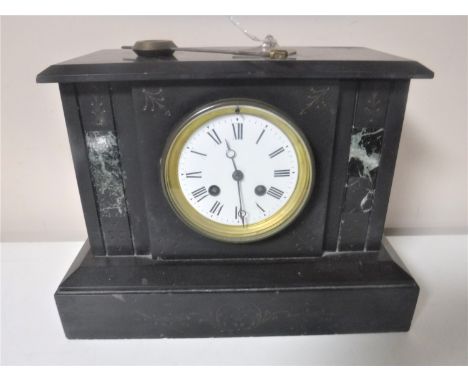 A Victorian slate and marble mantel clock with enamel dial, with pendulum and key