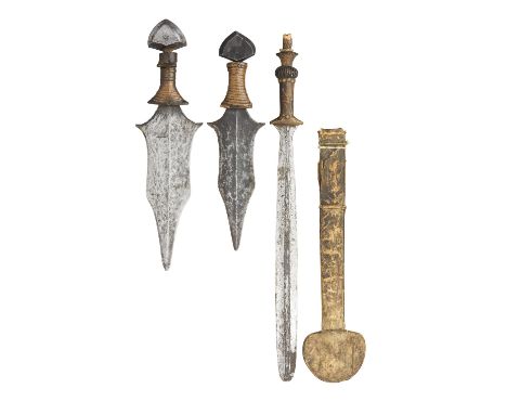 EIGHT AFRICAN EDGED WEAPONS AND THREE SPEARHEADS, 19TH/20TH CENTURY the first two daggers probably Southern Zaire, with shape