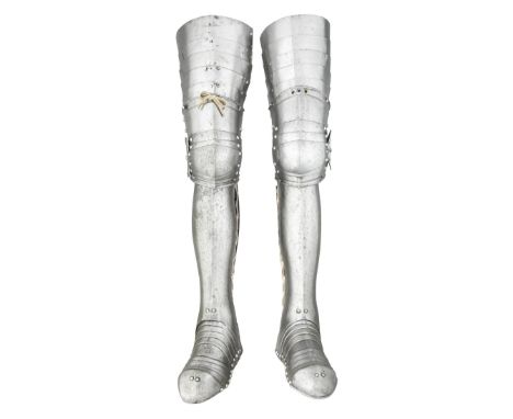 **A PAIR OF LEG HARNESS, 19TH CENTURY IN THE SOUTH GERMAN STYLE OF CIRCA 1540 comprising cuisses each formed of a long gutter