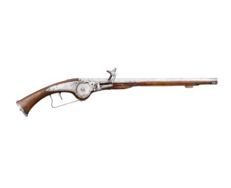 A 32 BORE GERMAN WHEEL-LOCK HOLSTER PISTOL, CIRCA 1650 with tapering barrel struck with Suhl control marks on the left of the