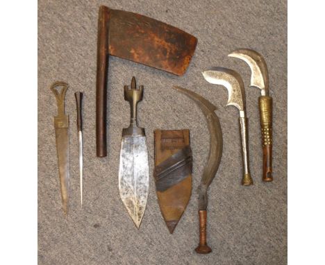 A MATTY ISLANDS AXE, PAPUA NEW GUINEA, 19TH CENTURY AND FIVE AFRICAN DAGGERS the first of characteristic form, with its woode