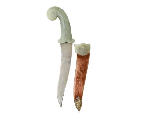 AN INDIAN JADE-HILTED DAGGER (KHANJAR), EARLY 19TH CENTURY with recurved double-edged blade, finely carved green jade hilt in