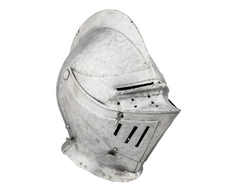 A GERMAN CLOSE HELMET FOR HEAVY FIELD USE, CIRCA 1560 with rounded one-piece skull rising to a high, file-roped medial comb (