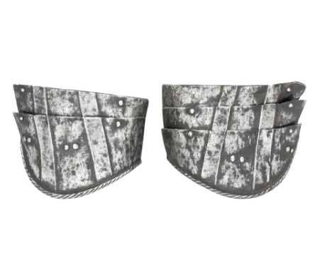 **THE LOWER ENDS OF TWO GERMAN TASSETS FOR LIGHT FIELD USE, THIRD QUARTER OF THE 16TH CENTURY not a pair but probably derivin