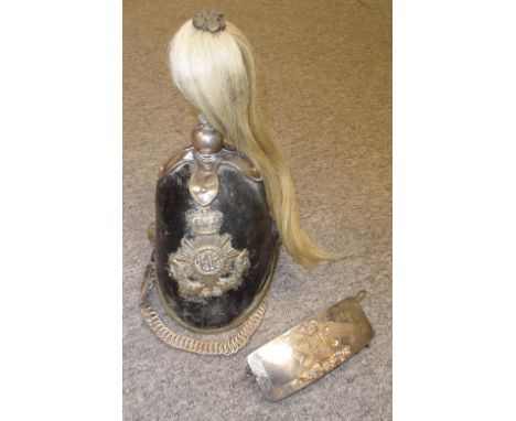 A BLACK LEATHER CAVALRY HELMET AND SILVER-MOUNTED CARTOUCHE POUCH OF 11TH (PRINCE ALBERT'S OWN) HUSSARS, CIRCA 1868-70 the fi