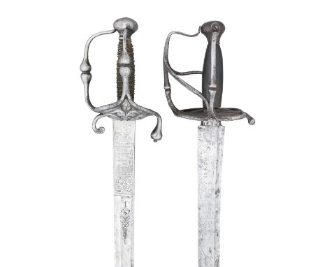 TWO NORTH EUROPEAN CAVALRY SWORDS, CIRCA 1630 the first with associated blade from an 18th century hunting sword, decorated w