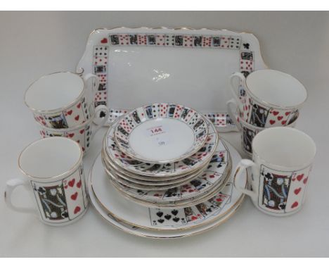 A selection of playing card themed teaware