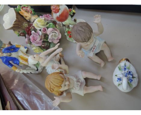 A collection of decorative ceramics including Bisque and Fauna ware