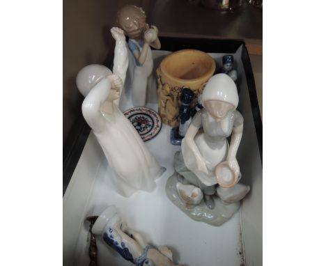 A selection of ceramics including Nao by Lladro