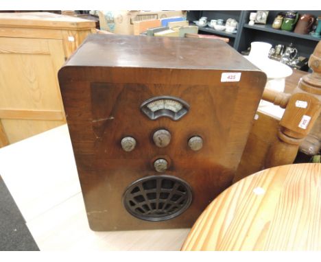 An early to mid 20th Century vintage wireless, in walnut case, having revolving base (sold as untested collectors item)