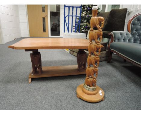 A vintage 'elephant' table and similar lamp
