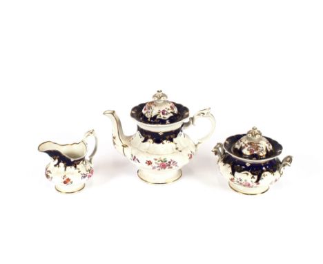 A Coalport type tea set, having floral spray decoration on a rich blue ground, heightened in gilt, comprising cups, saucers, 