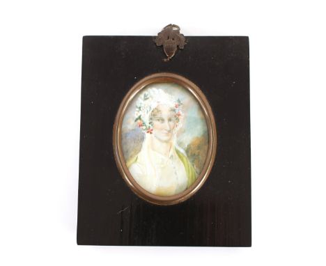 Two 19th Century portrait miniatures, in ebonised and brass frames