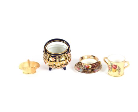 A Coalport miniature cup and saucer, with painted foliate spray decoration; a Royal Crown Derby miniature cauldron; a Worcest