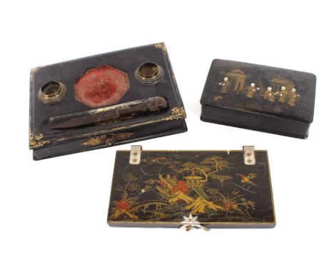 A Victorian papier mache and gilt decorated desk stand; an Ethnic paper-knife; an Oriental lacquered and mother of pearl trin