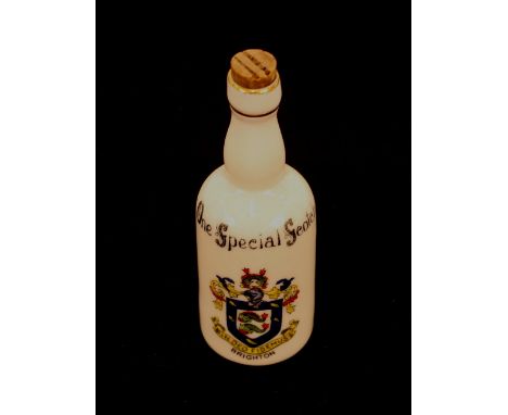 A collection of crested china bottles, various manufactures including Shelley and Arcadian, numerous "one Special Scotch" exa