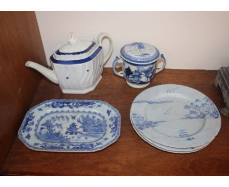A 19th Century Pearlware bowl, inscribed "one bowl more"; a circular Pearlware charger with stylised floral decoration and sc