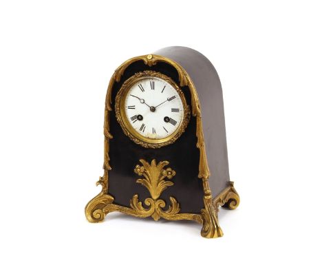 A 19th Century ebonised and ormolu mounted mantel clock, 8 day movement striking on a gong, circular white enamel Roman numer