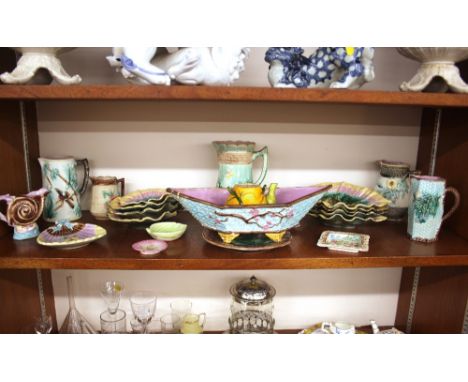 A collection of various Victorian majolica ware jugs; serving plates, jardiniére, teapot etc., (21)