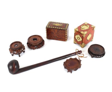 An Oriental lacquered cardbox; a walnut brass mounted trinket box; a Shillelagh and four carved hardwood vase stands, (7)
