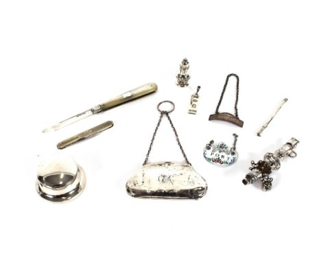 A Victorian silver baby's rattle, AF; a silver purse; a silver bladed and mother of pearl handled folding knife; two decanter