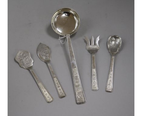 Five assorted Vietnamese white metal servers including a soup ladle.