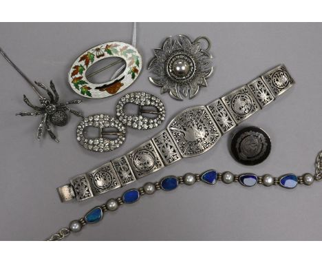 Mixed bijouterie including silver and enamel brooch, silver and gem set necklace and two paste set buckles.