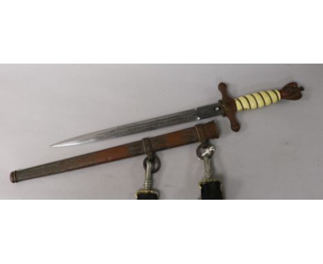 A German WWII Kreigsmarine Officer's dagger, the blade impressed 'Original Eickhorn Solingen', in original scabbard (some dam