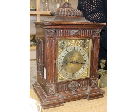 An oak bracket clock width 33cm height 47cm