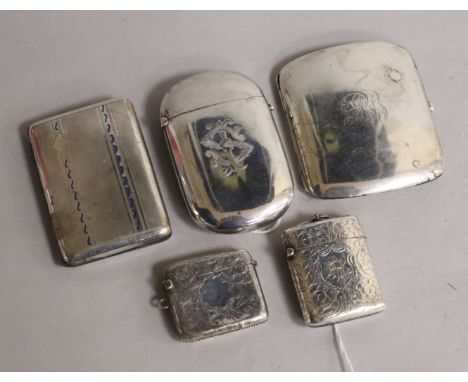 A Victorian oval silver cigarette case, Birmingham 1876, Hilliard & Thomason and four other items, including two engraved sil