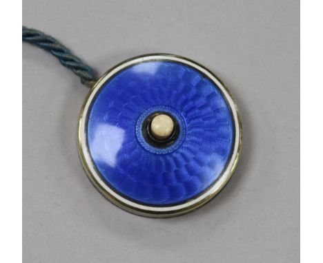 An early 20th century 935 white metal and guilloche enamel bell push, with chord, 35mm.