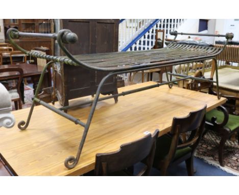 A tubular steel slatted garden bench, W.175cm.